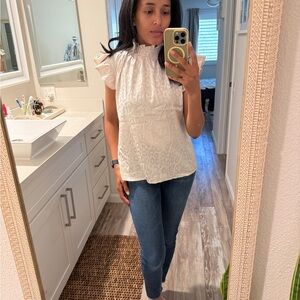 White Ruffled Sleeveless Blouse